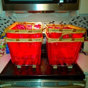 Victoria Secret Pink clear plastic bins.